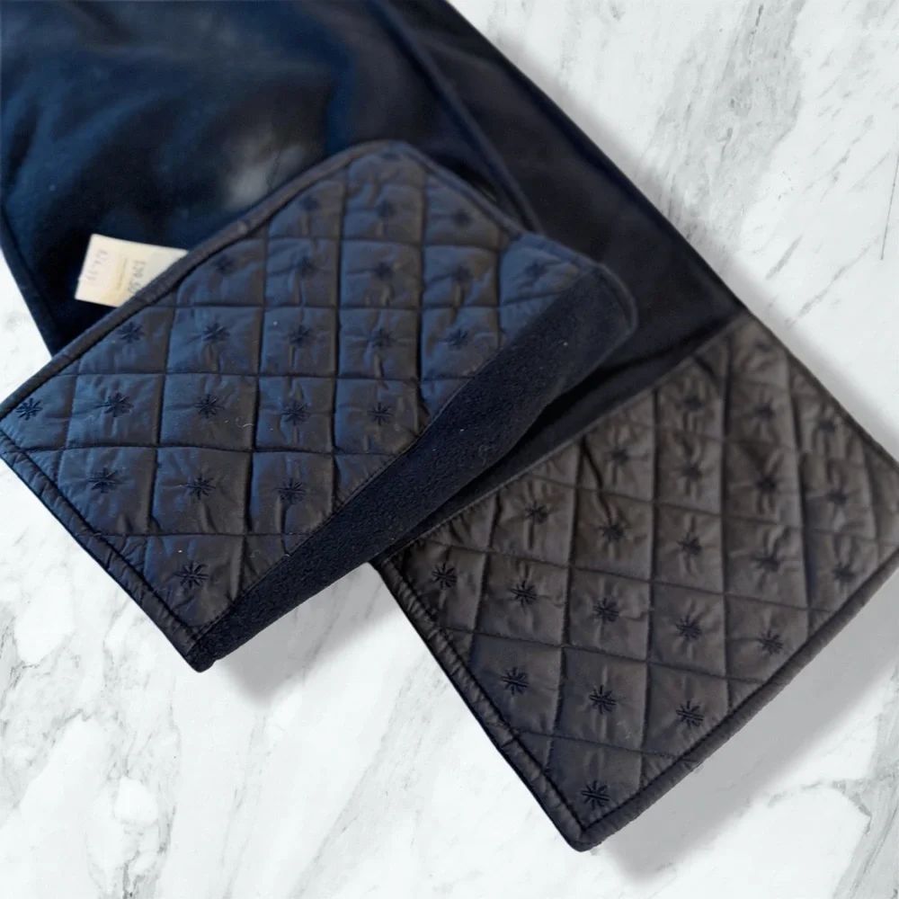 Eddie Bauer finely woven‎ fleece scarf in black with a quilted accent. 64” x 9”